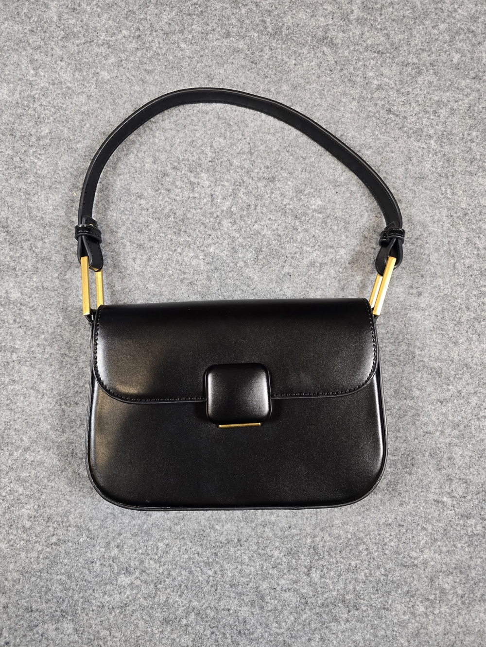 Madison West Classic Black Shoulder Bag with Gold Accents